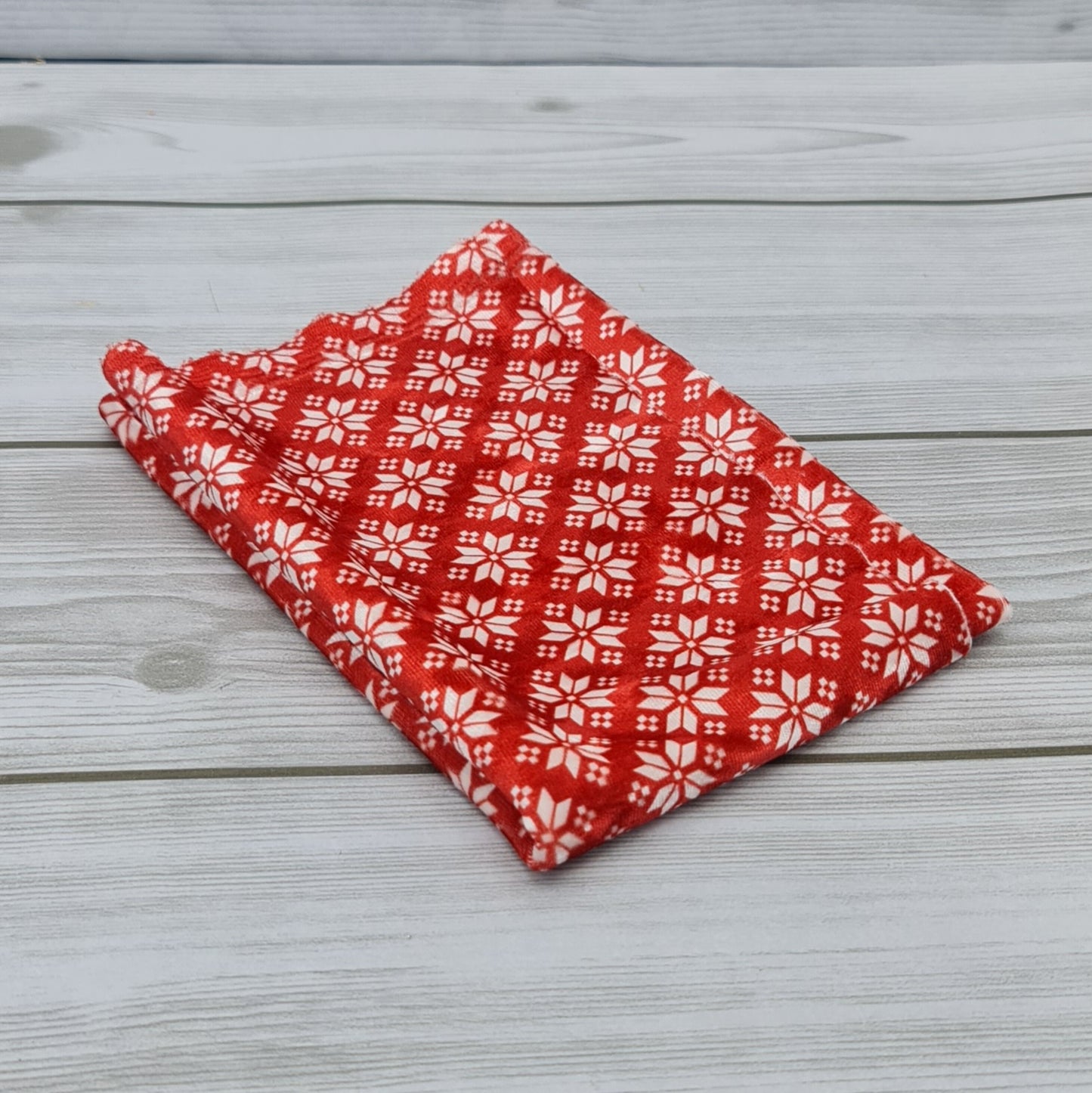 Tessuto Ciniglia Neve Rosso Le Meraviglie di Teo