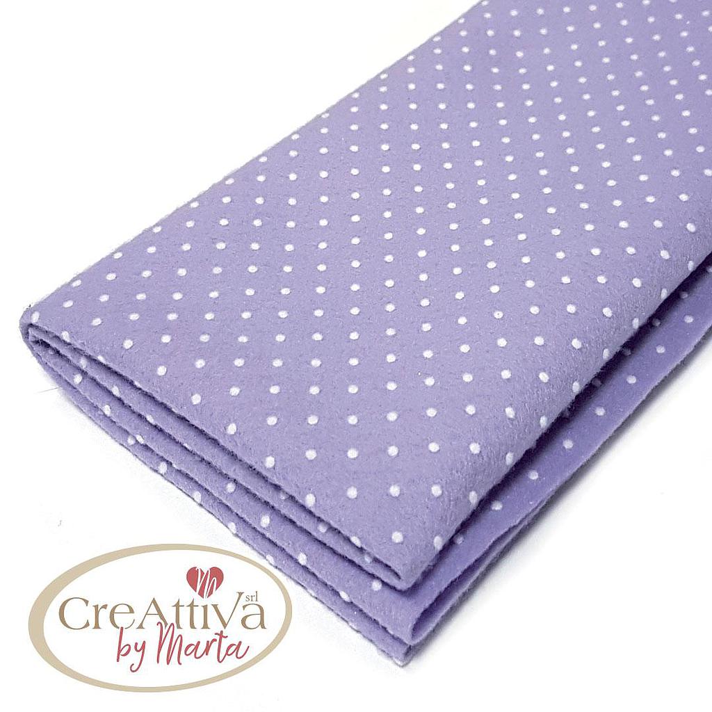Pannolenci floqué à pois lilas
