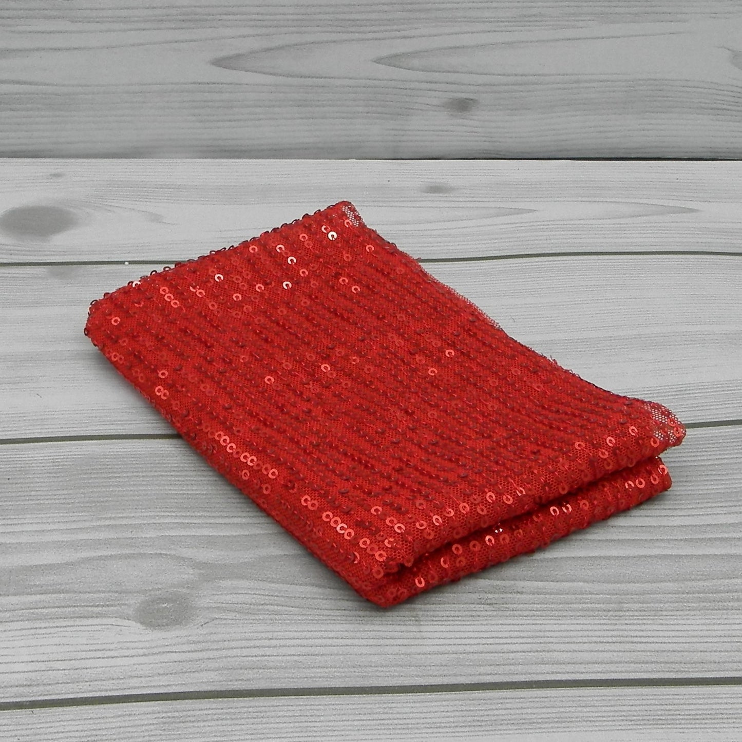 Tissu à paillettes dorées