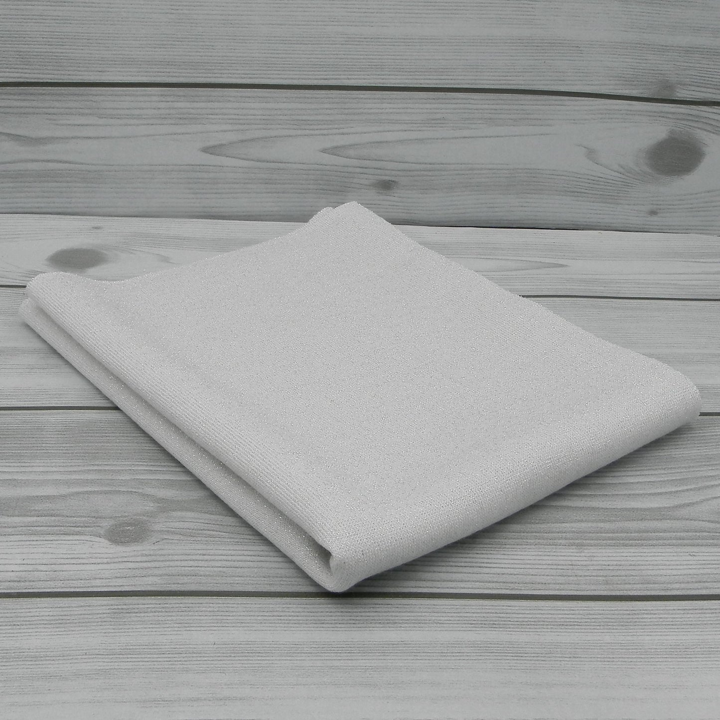 Tissu à paillettes dorées