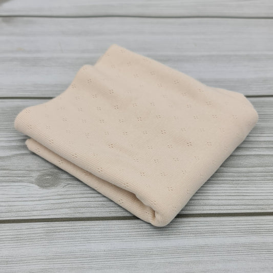 Ivory textured jersey fabric