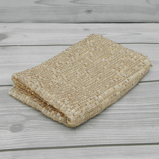 Tessuto il Pajettino Oro Chiaro I Nastri di Mirta